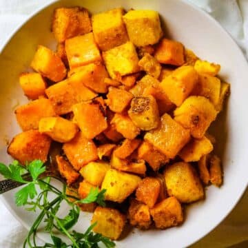roasted butternut squash in white bowl.