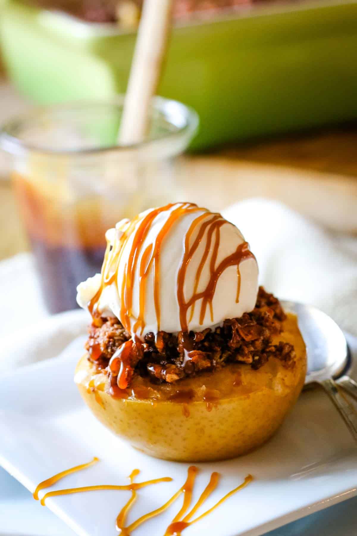 baked apple half with ice cream and salted caramel