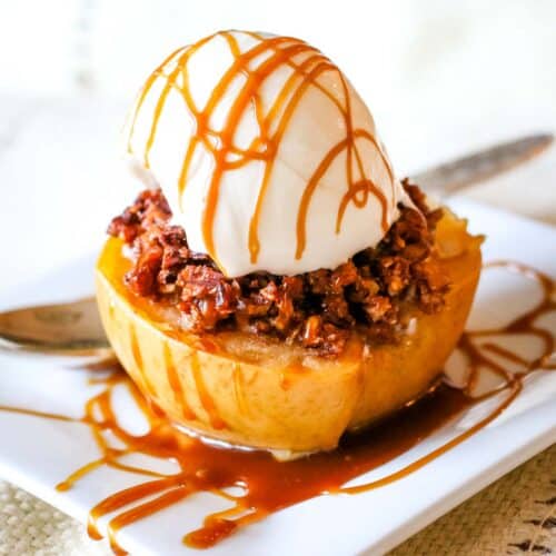 stuffed apple half with ice cream and caramel drizzle.