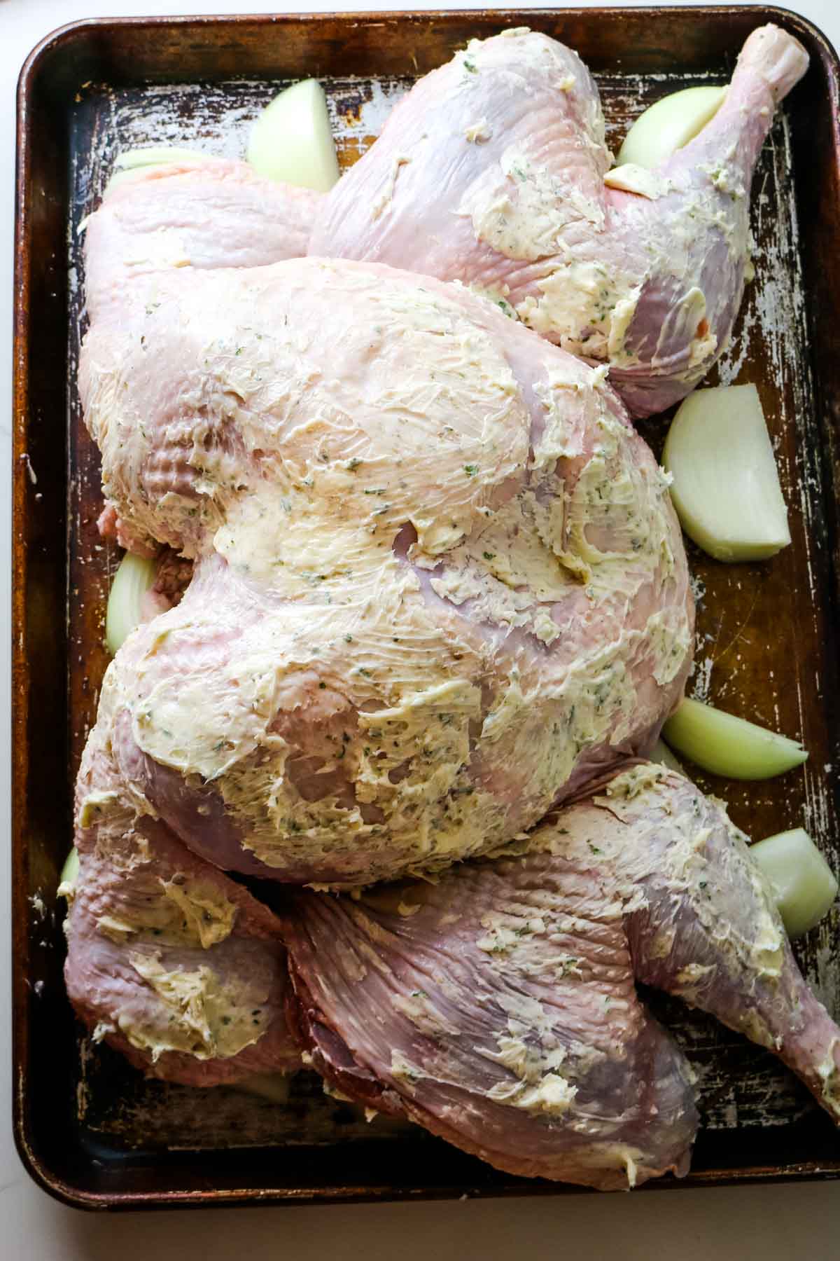 buttered turkey over onions