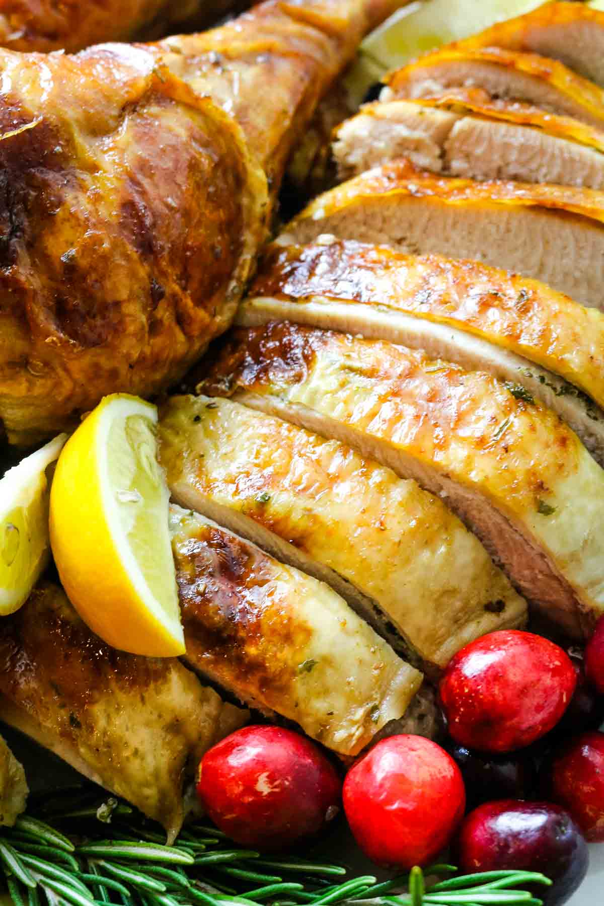 turkey breast sliced with cranberries.