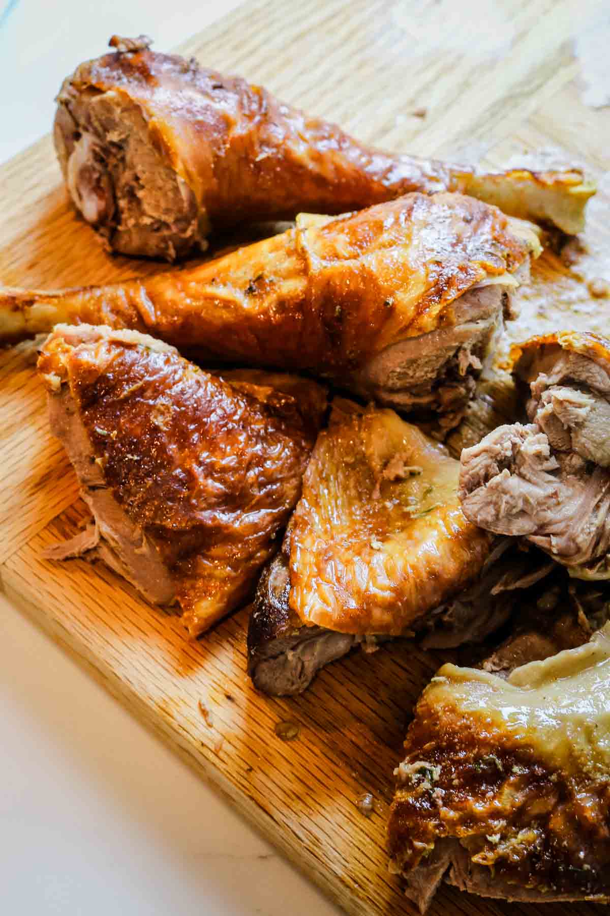turkey meat with skin on cutting board