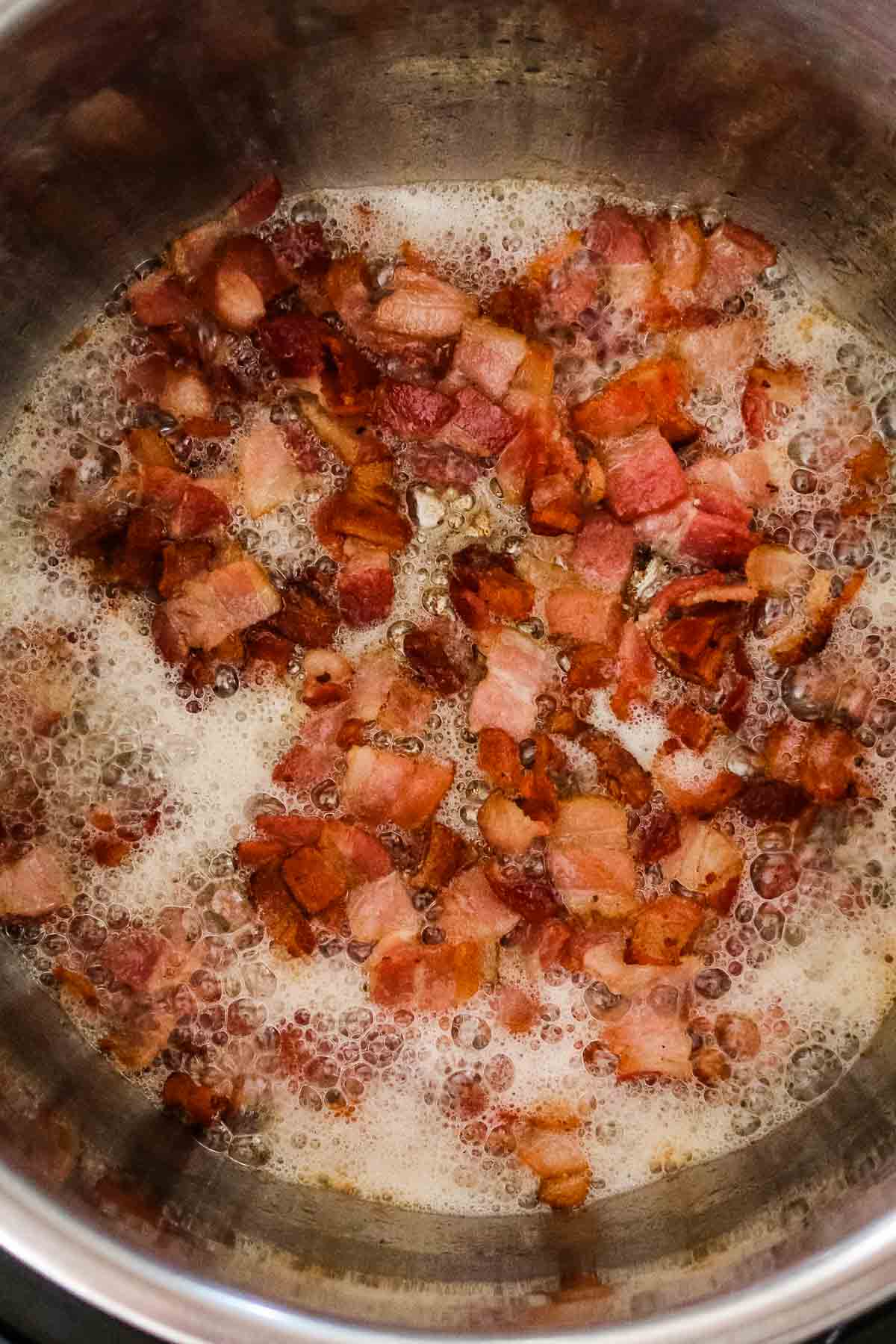 Cook bacon in instant Pot inner pot.