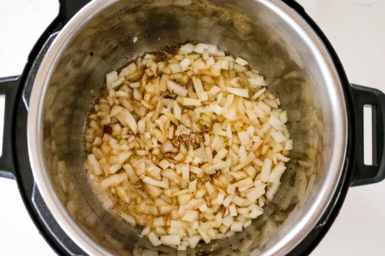 diced onions added to instant pot.
