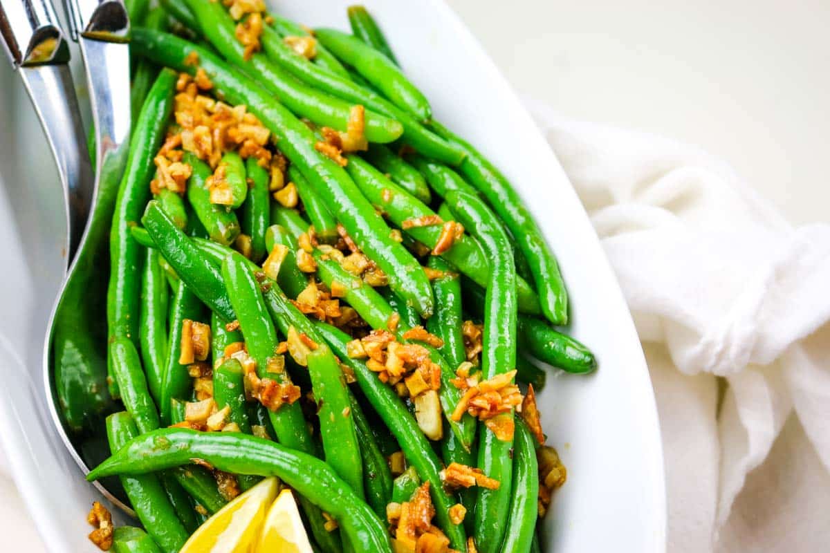 green beans with garlic morsels and lemon.