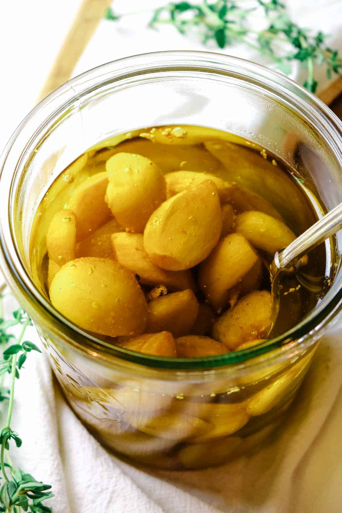 garlic in olive oil in jar.