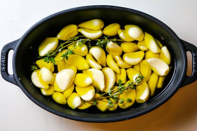 garlic and olive oil in baking dish.