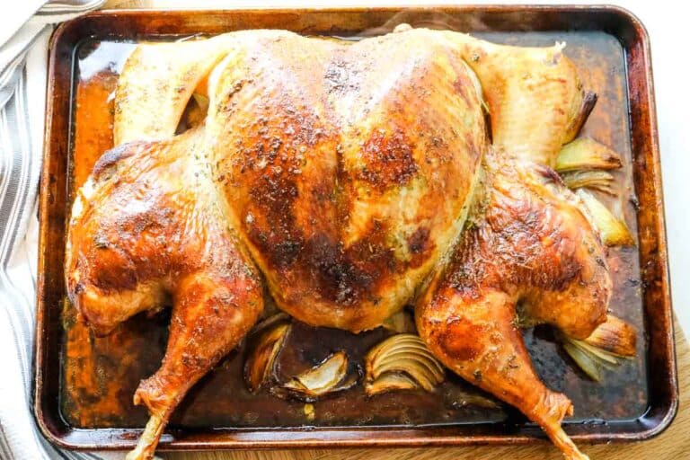 roasted turkey on baking sheet.