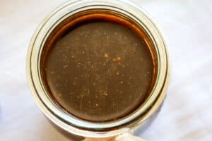 dark sauce in jar.