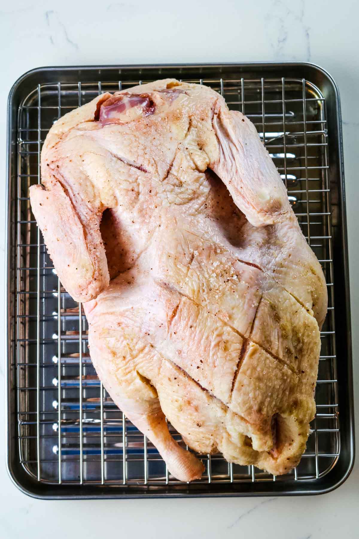 air fryer duck on roasting sheet.