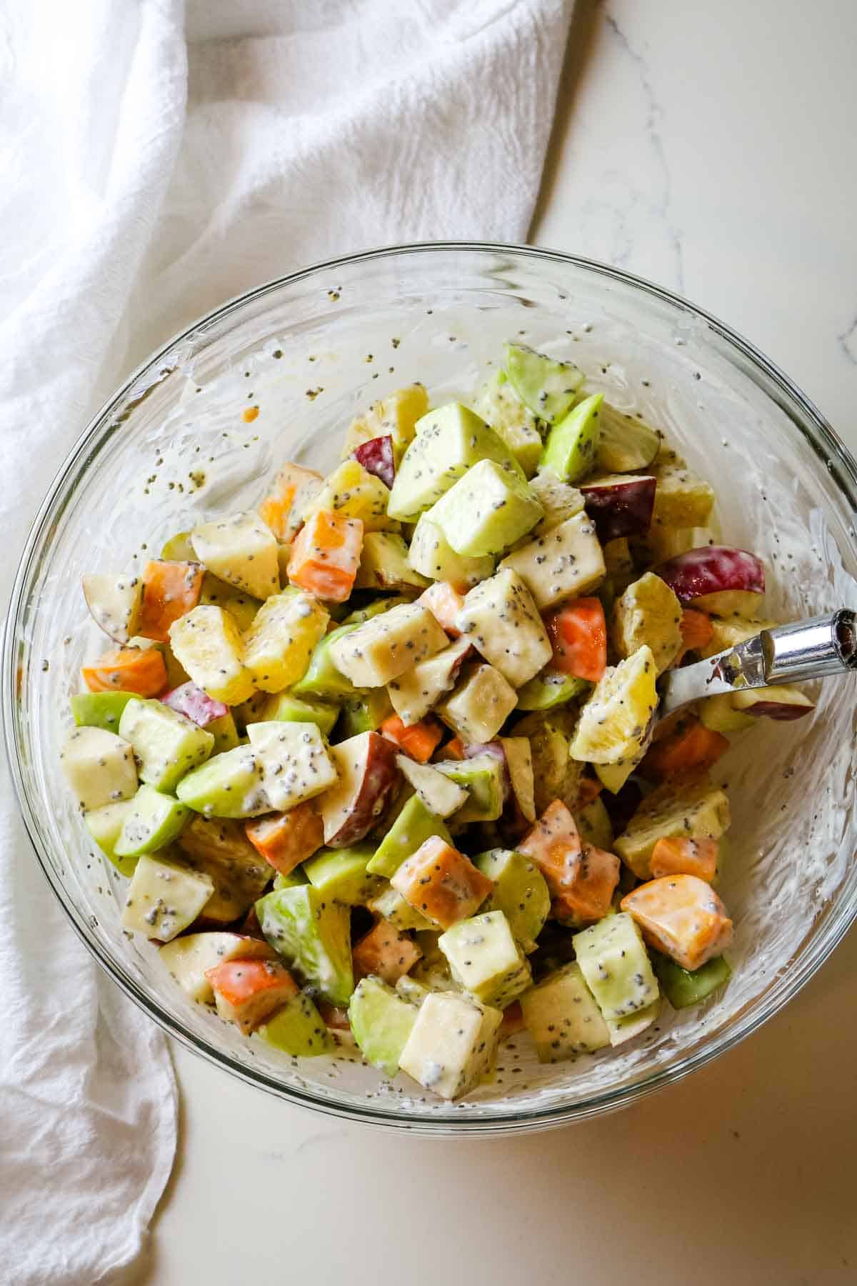fruit salad tossed in creamy dressing for fall fruit salad