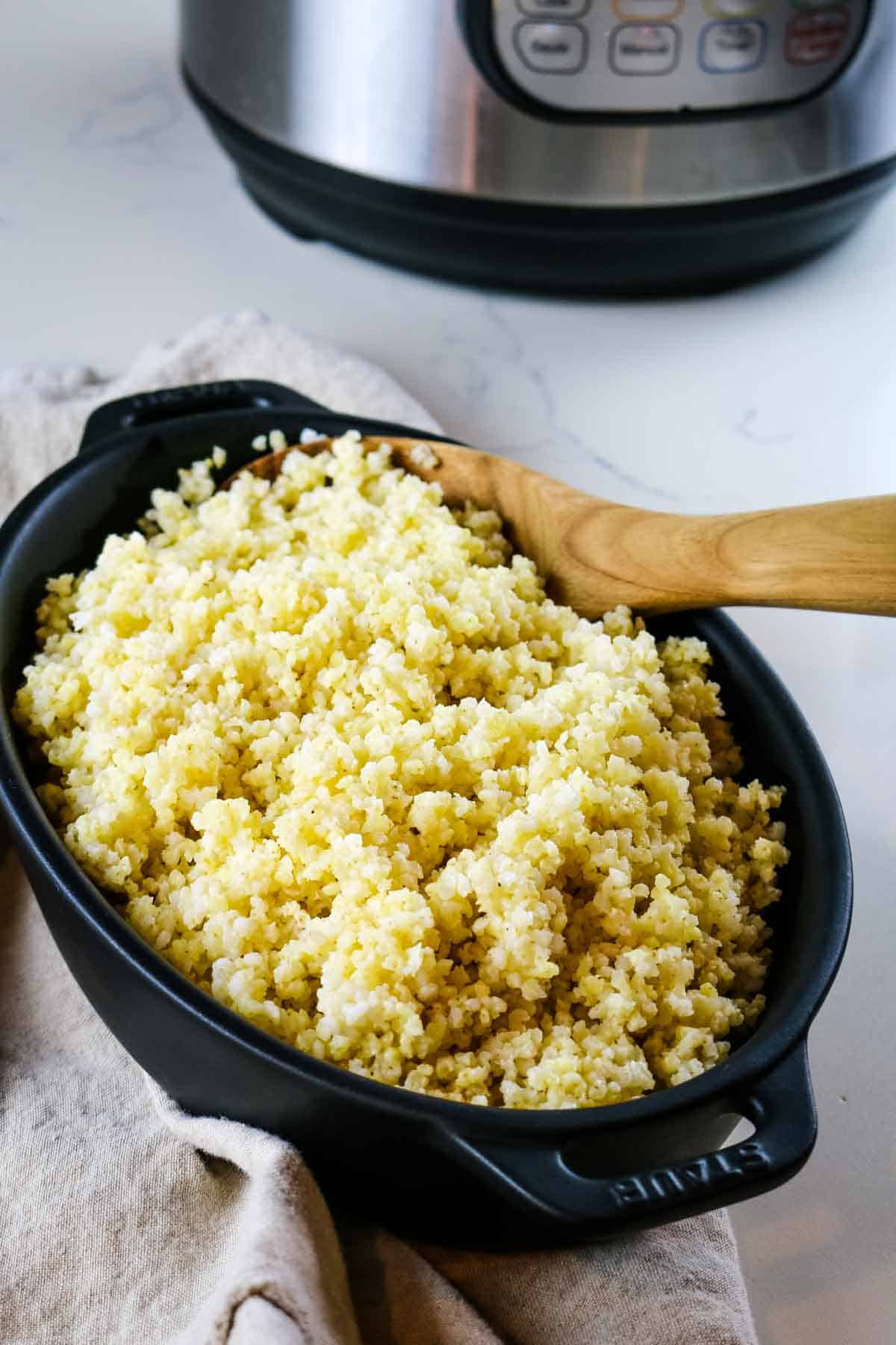 cooked millet in casserole dish and instant pot.
