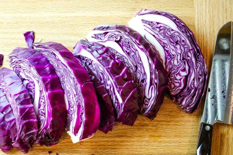 cut purple cabbage into cabbage steaks.