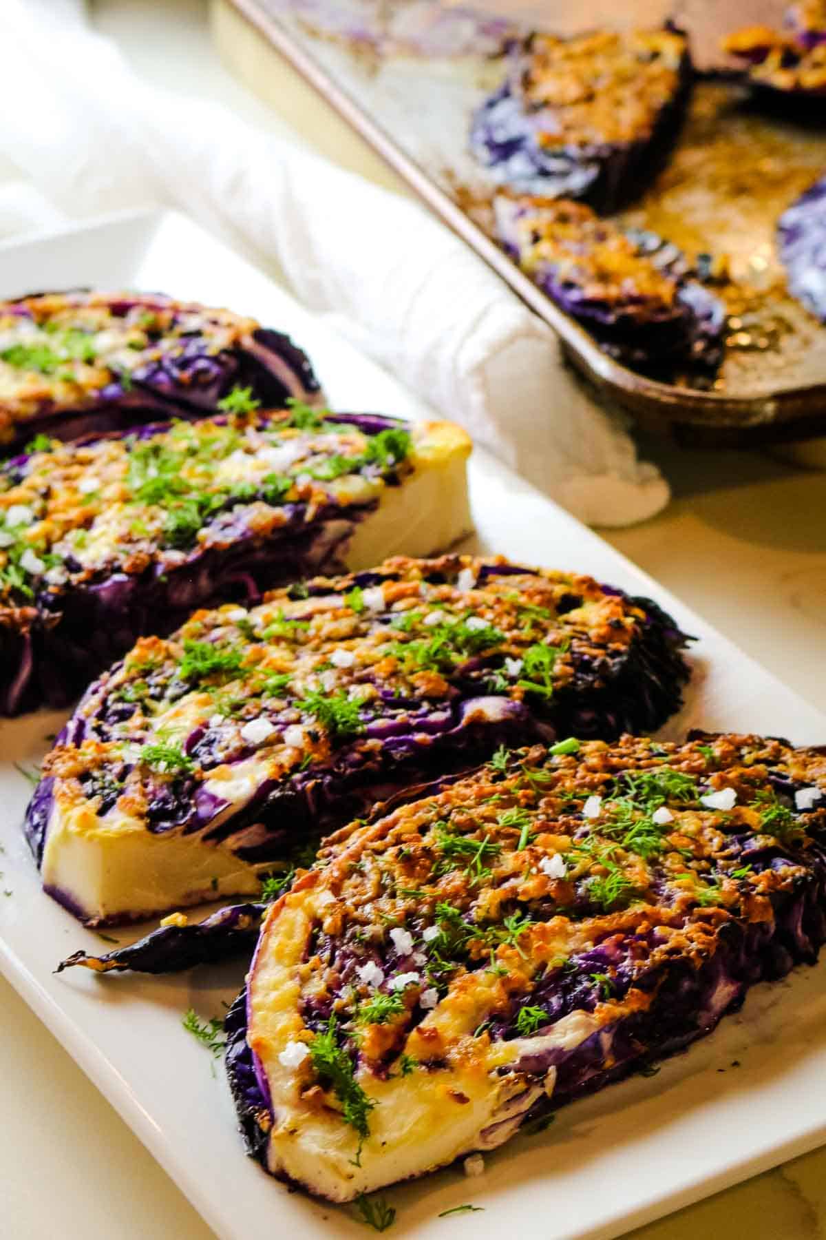 roasted red cabbage steaks on platter.