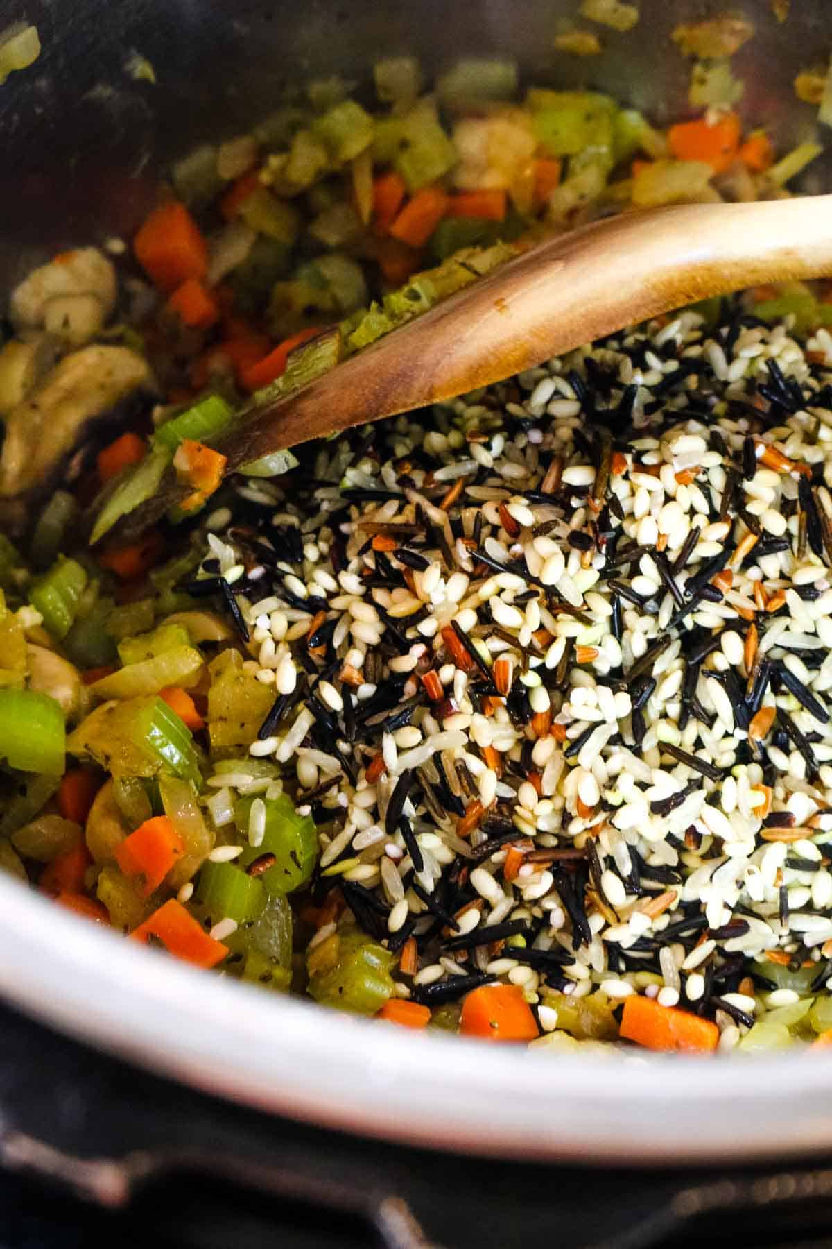 wild rice added to veggies in instant pot.
