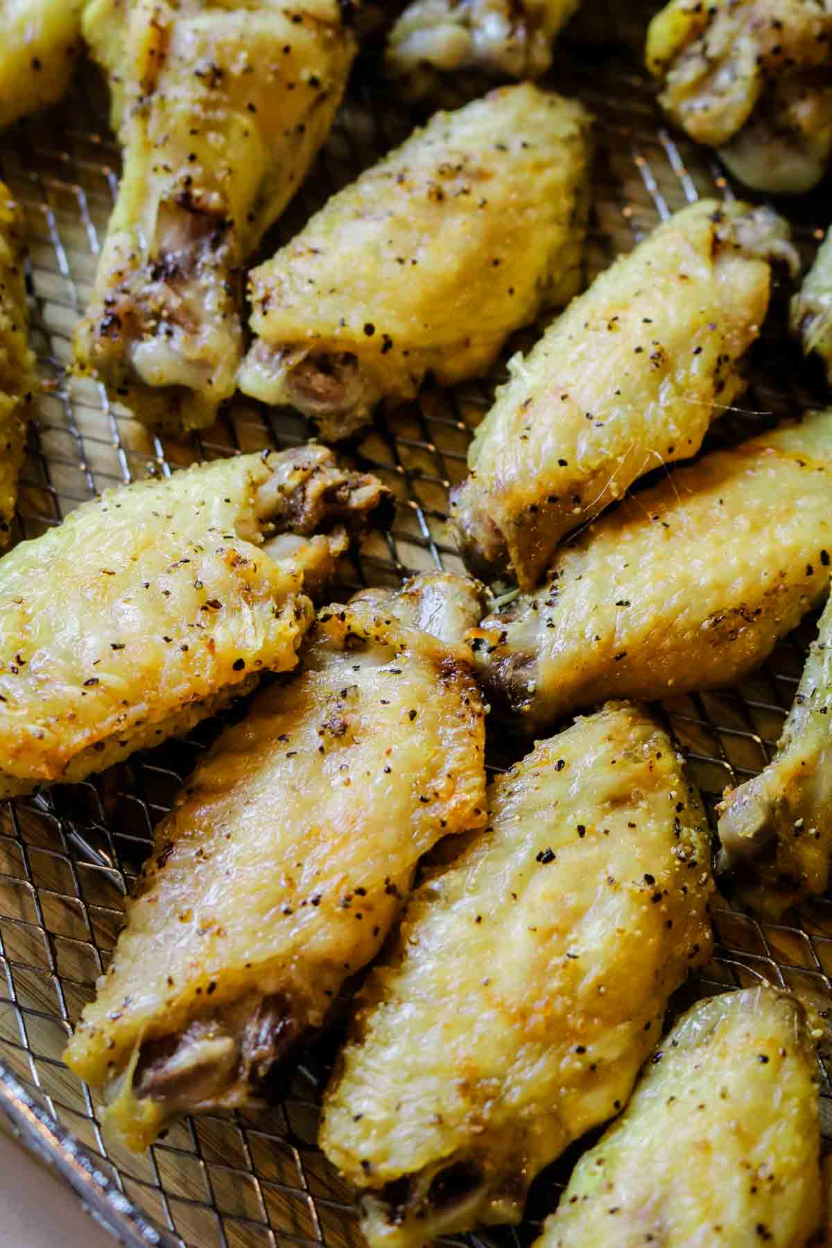 baked chicken wings on crisper tray.