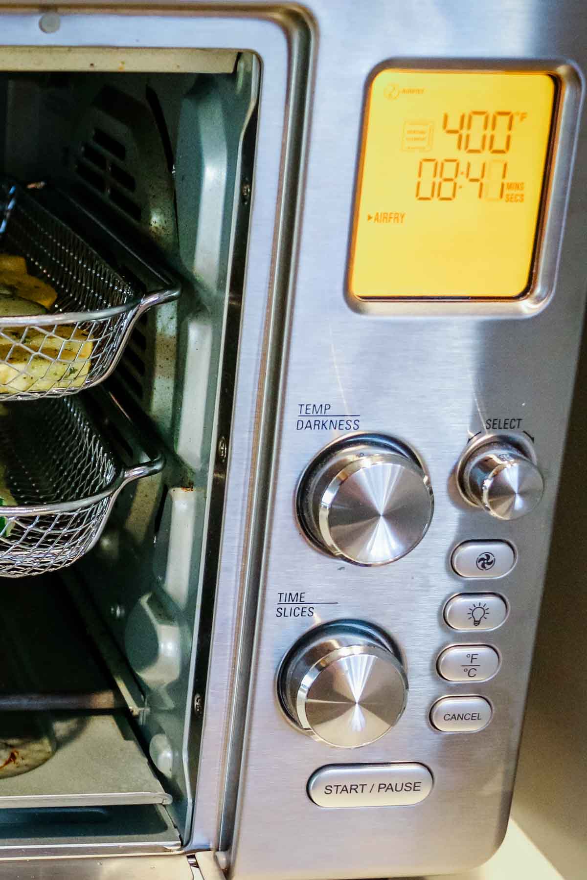 close up of convection oven air fryer with display screen.