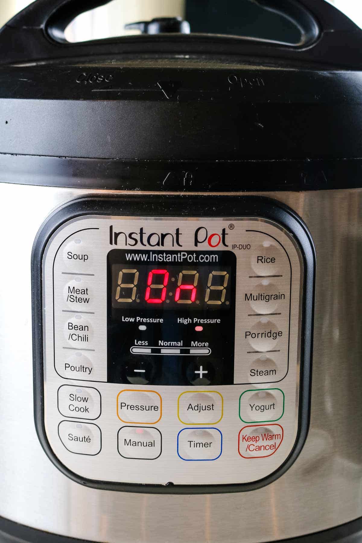 instant pot front face with display that says ON.