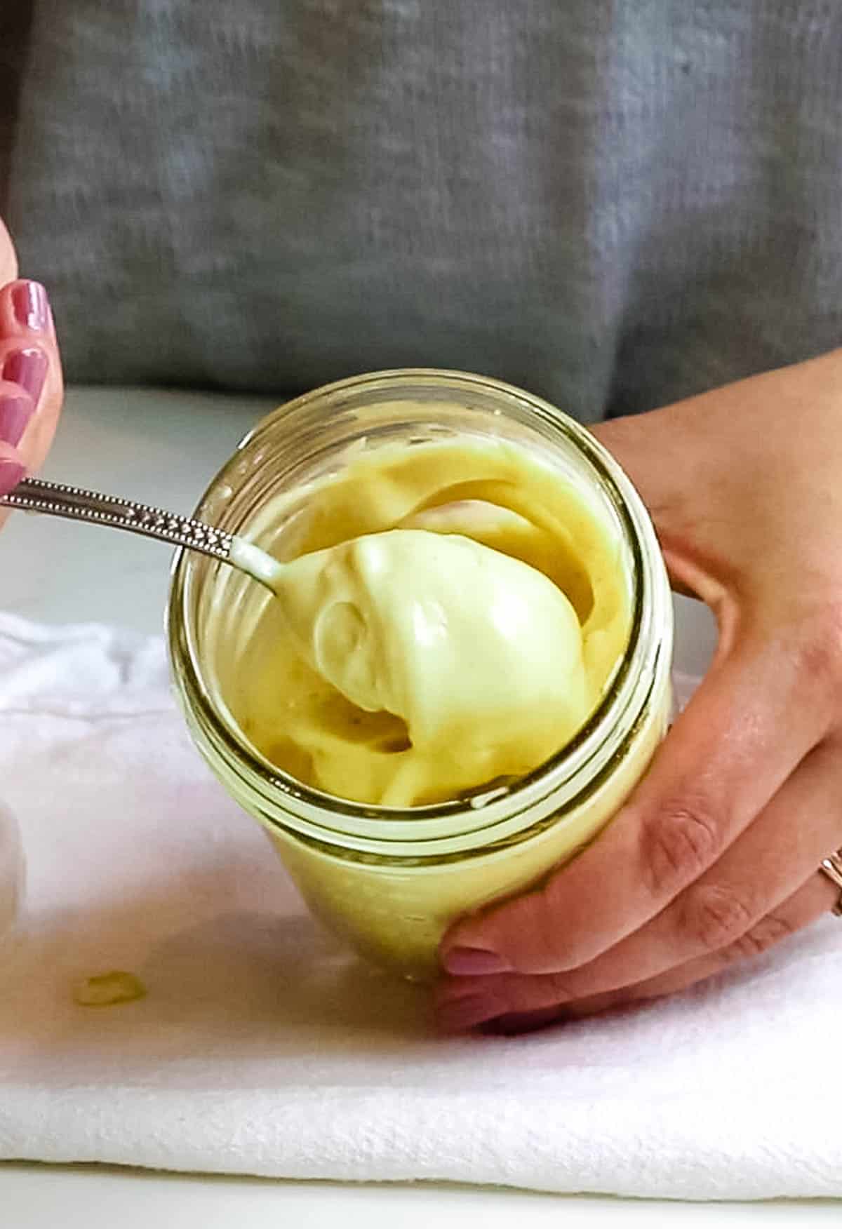 mayonnaise in a jar with a spoon