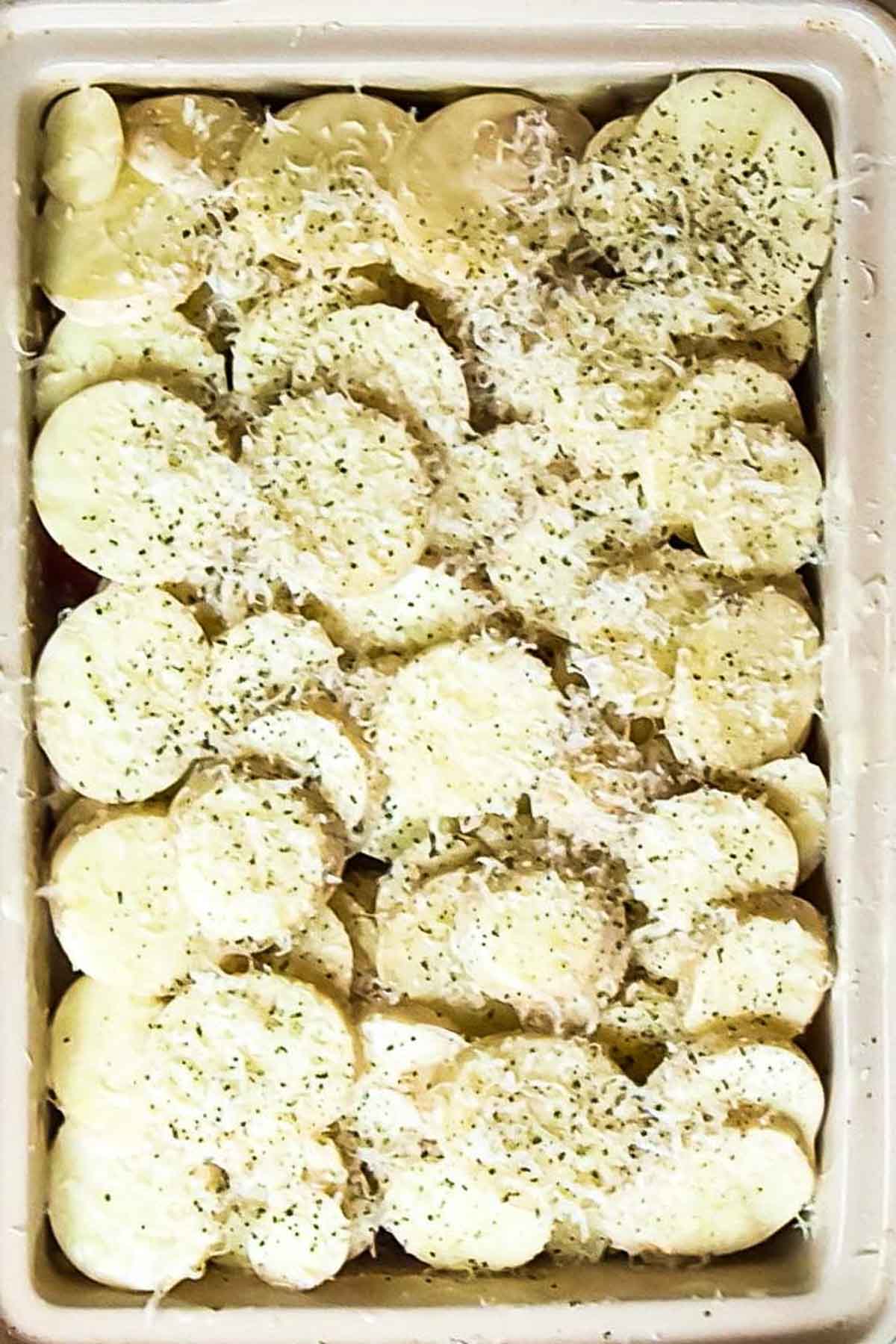 scalloped potaoes in a casserole dish.