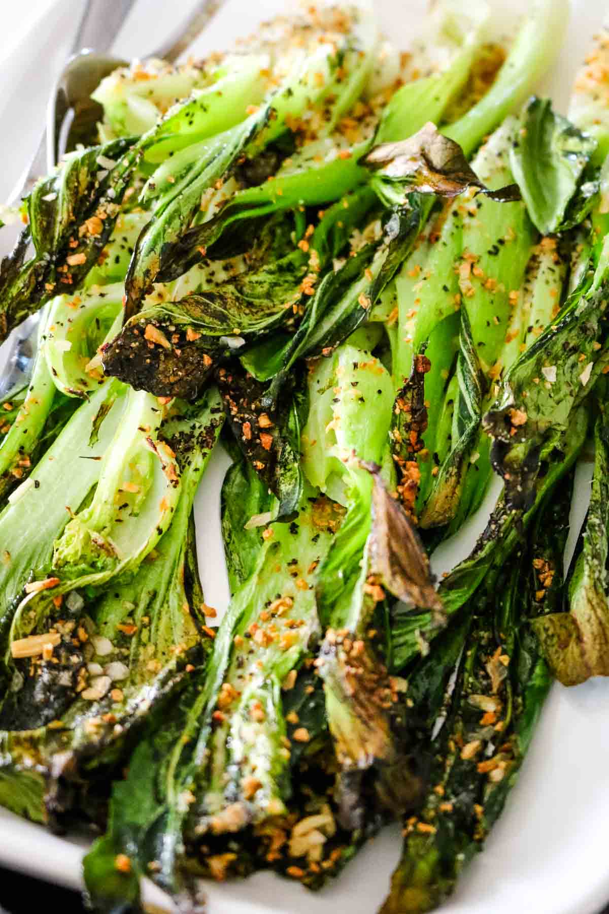 crispy lettuce leaves and tender stalk of easy roasted bok choy recipe in air fryer.