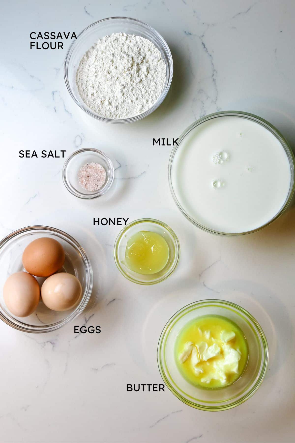 labeled ingredients for gluten free crepes: cassava flour, salt, milk, honey, eggs, and butter.