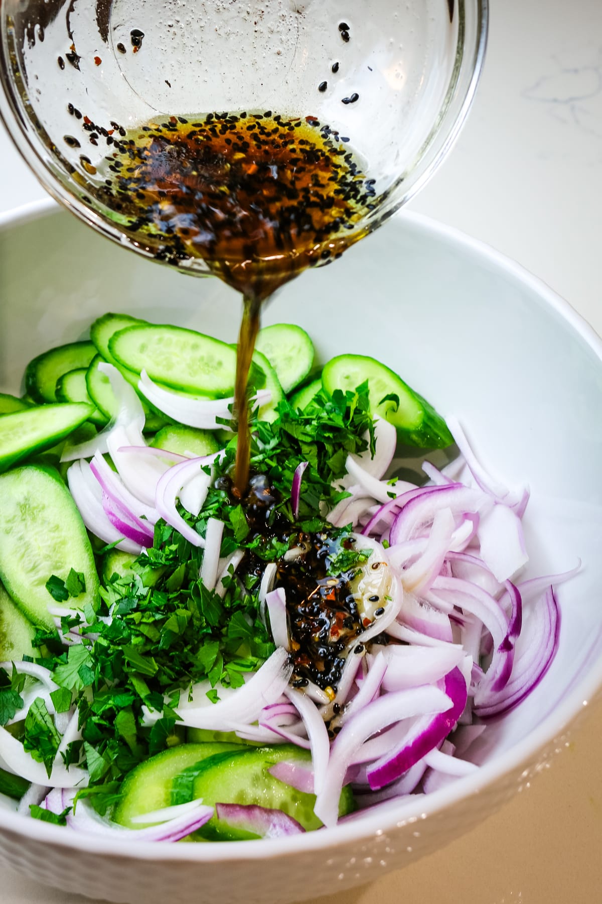 roasted sesame dressing poured over cucumbers and red onion asian salad dressing.