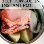 cow tongue in stainless steel pot with text overlay that says "how to cook beef tongue in instant pot".