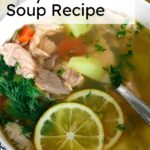 text overlay saying easy fish soup recipe over a image of fish soup in a bowl with a spoon inside