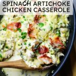 healthy spinach artichoke chicken casserole with a wooden spoon and text overlay.