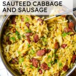skillet with cabbage and sausage with text overlay.
