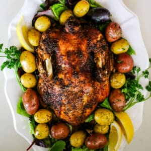 Seasoned duck, with marble potatoes, lemon and herbs.