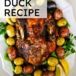 Seasoned slow cooker duck, with potatoes and vegetables on the side.