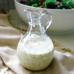 House salad dressing inside a clear jar.