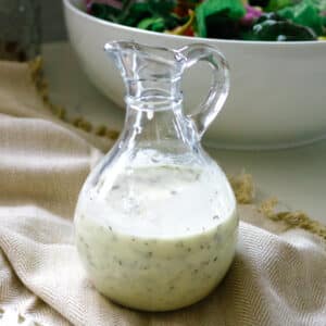 House salad dressing inside a clear jar.