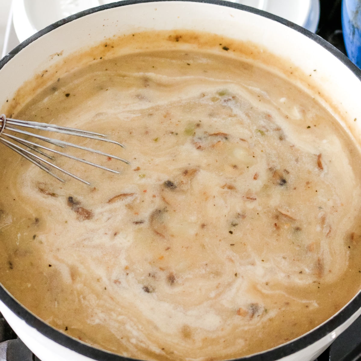 The cream is added to the pot.