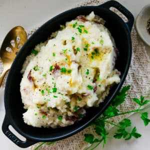 seasoned mashed potatoes in baking dish.