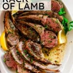 roasted rack of lamb on a plate with lemon and cilantro with recipe title above.