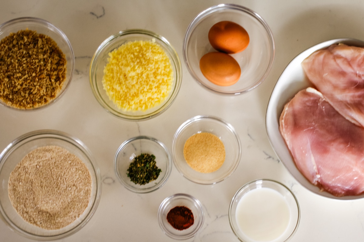 individual ingredients in bowls for chicken cutlet recipe.