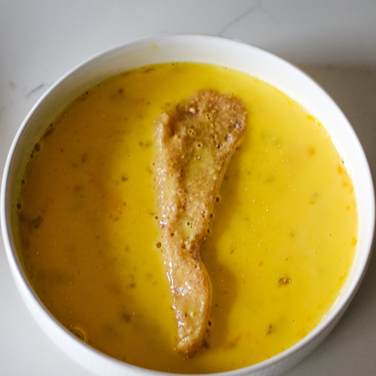 chicken cutlets dipped in egg.