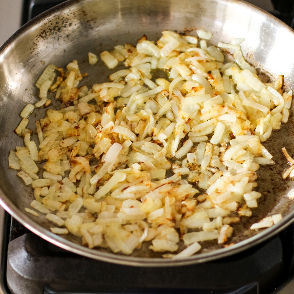 carmalized onions cooking in a pan.