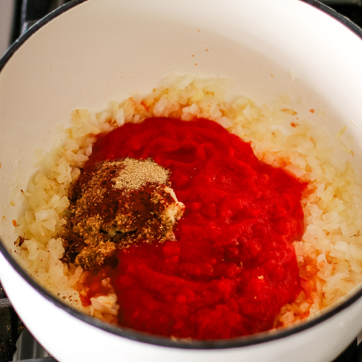 Ingredients for the kharcho soup in a pot. Herbs and spices.