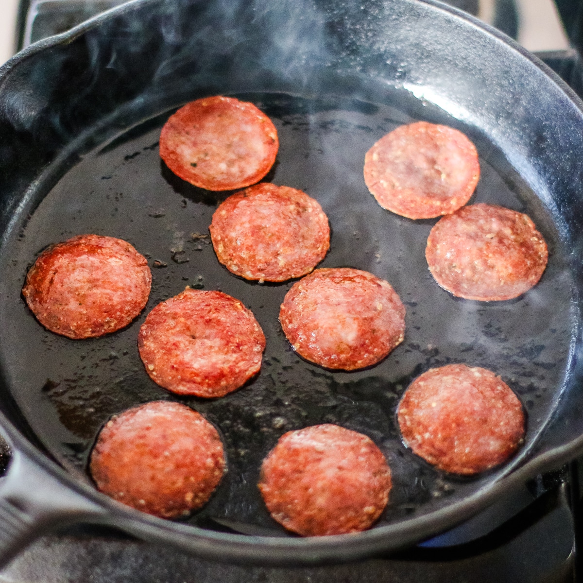 pepperoni slices on a pan.