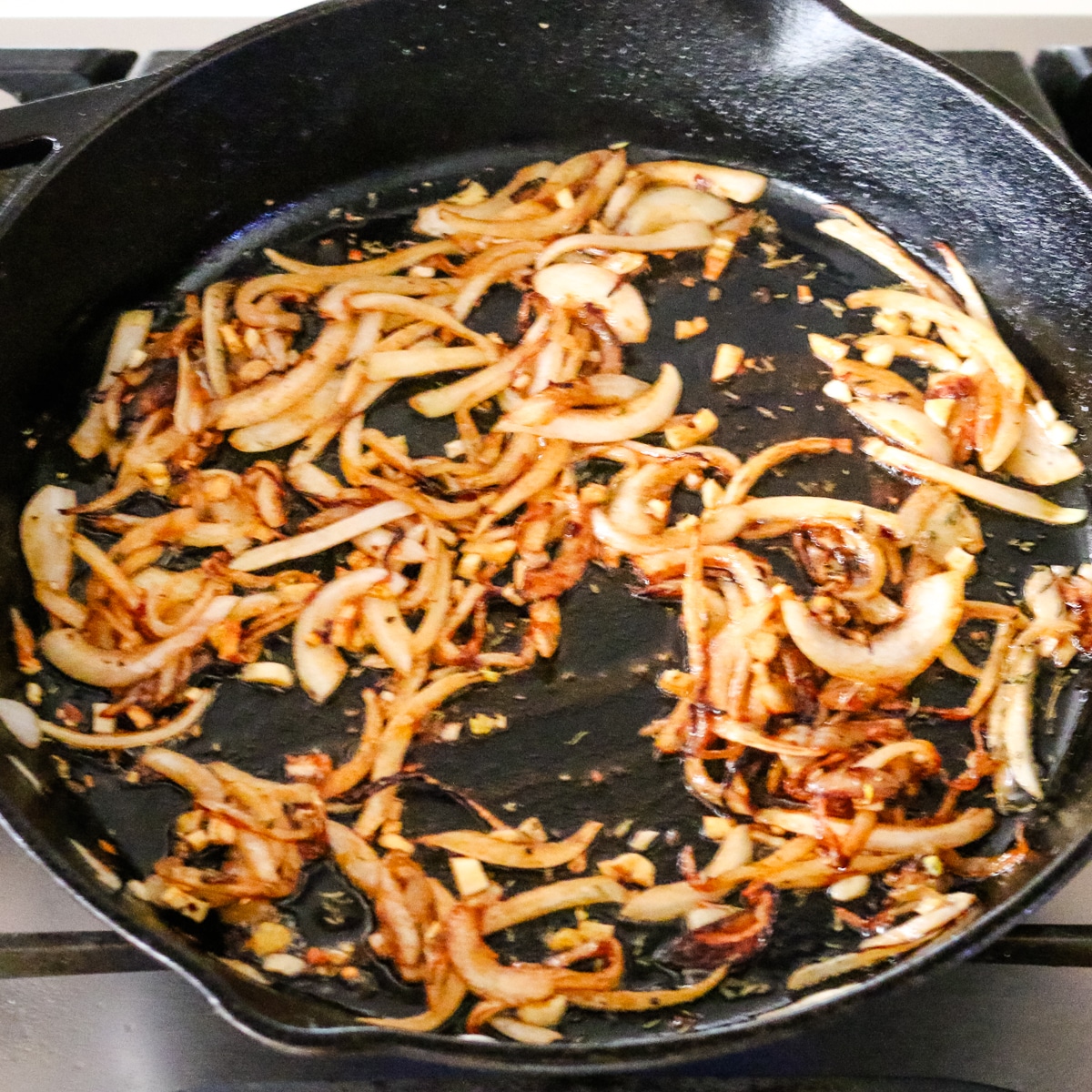 sautéing onions in a skillet.