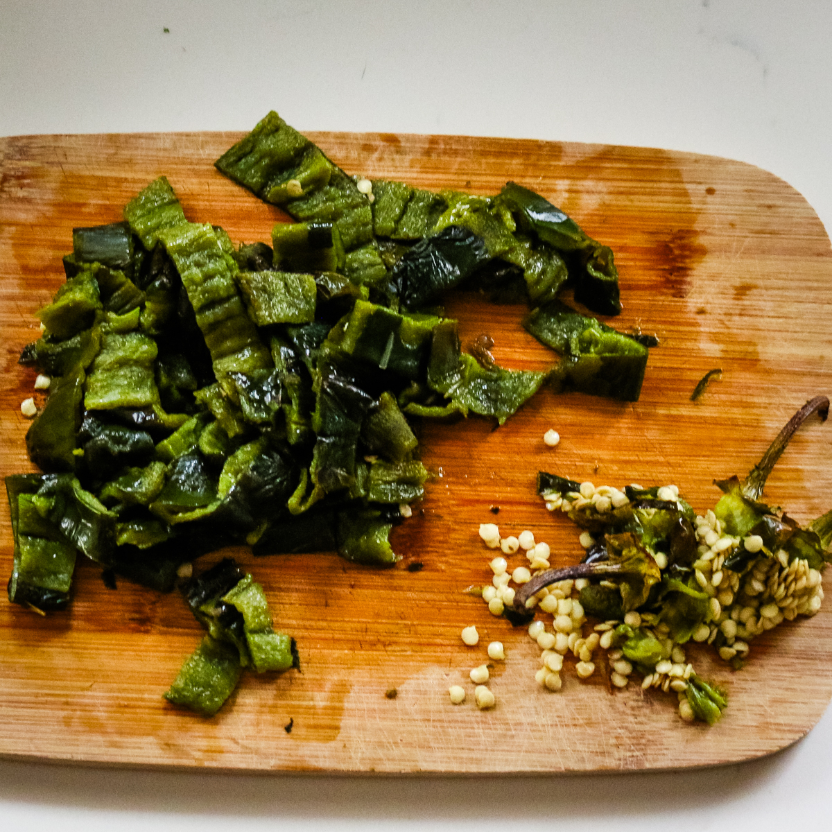 chopped eggplant on a cutting board.