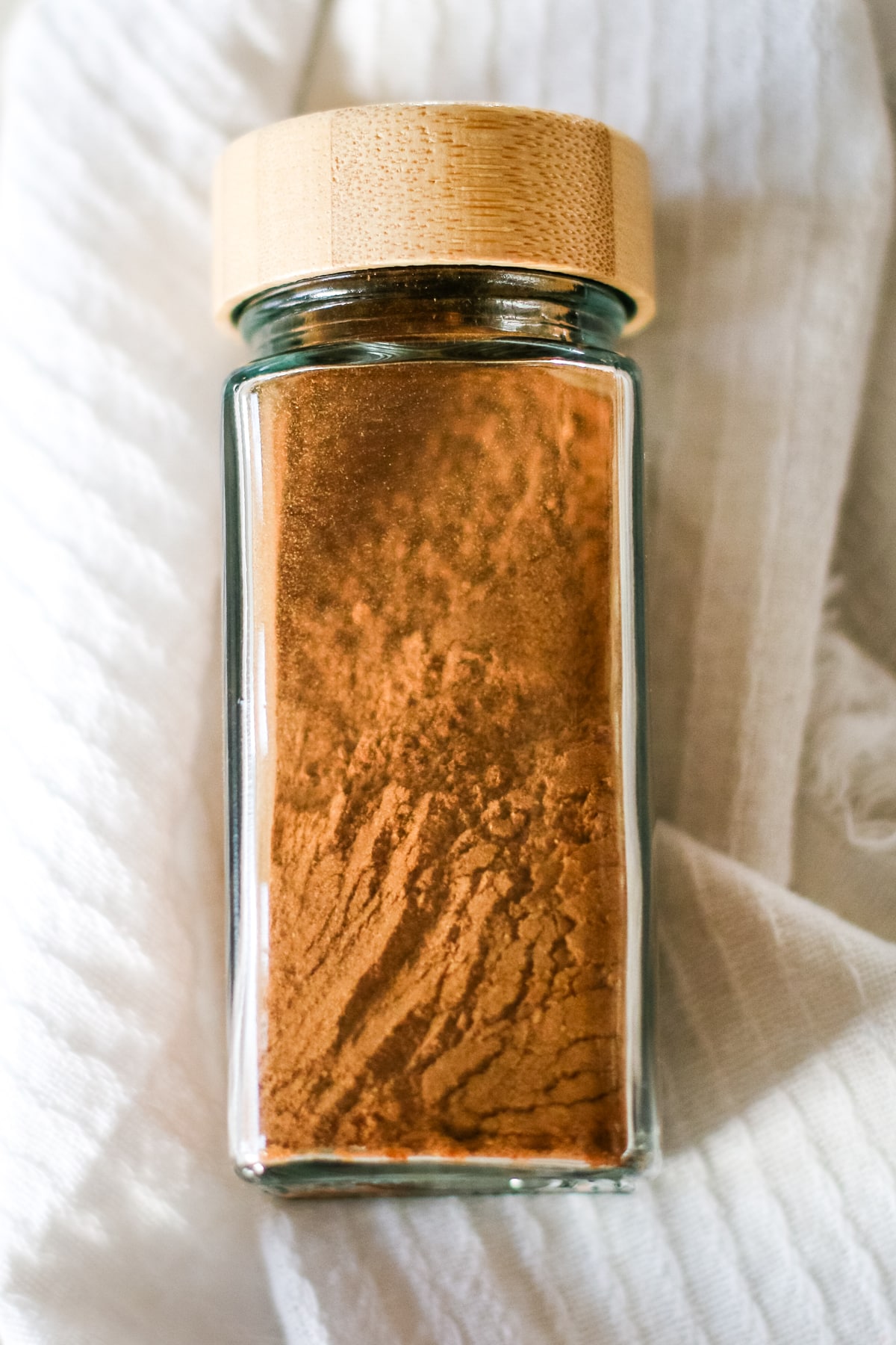 pumpkin pie spice in a spice jar.