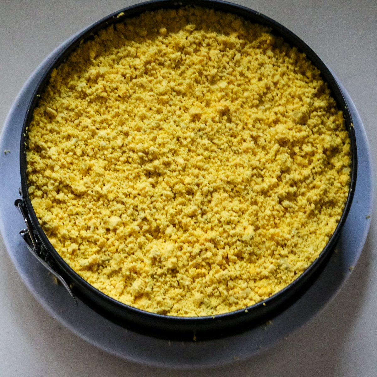 crumbled egg yolks sprinkled on top of the mimosa salad.