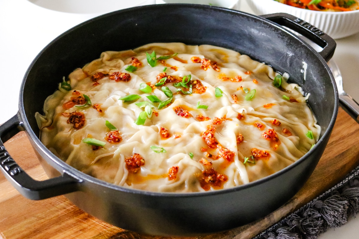dumpling lasagna in a chistera saute pan.