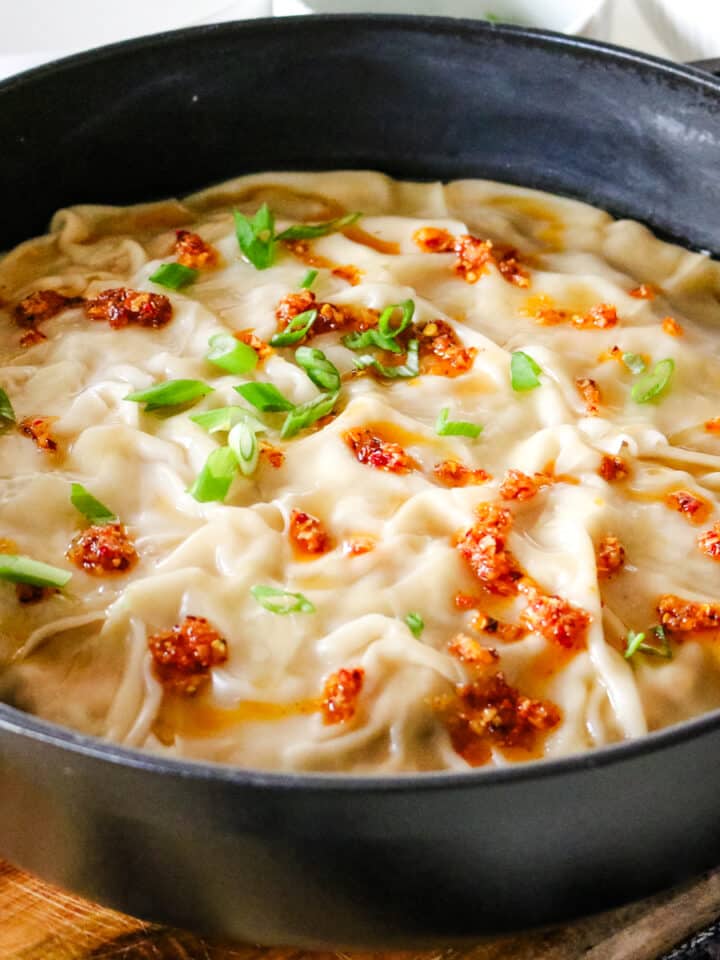 dumpling lasagna in a chistera saute pan.