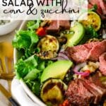 steak salad in a bowl with text overlay saying, "Summer Steak Salad With Corn and Zucchini".